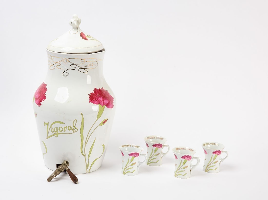 Armour's Vigoral Dispenser with Four Glasses: Armour's Vigoral countertop beverage dispenser with original copper insert. Together with 4 cups. American, circa 1900. Dispenser: H 20-1/2 in. Cups: H 3-1/2 in. D 3-1/8 in. Provenance: