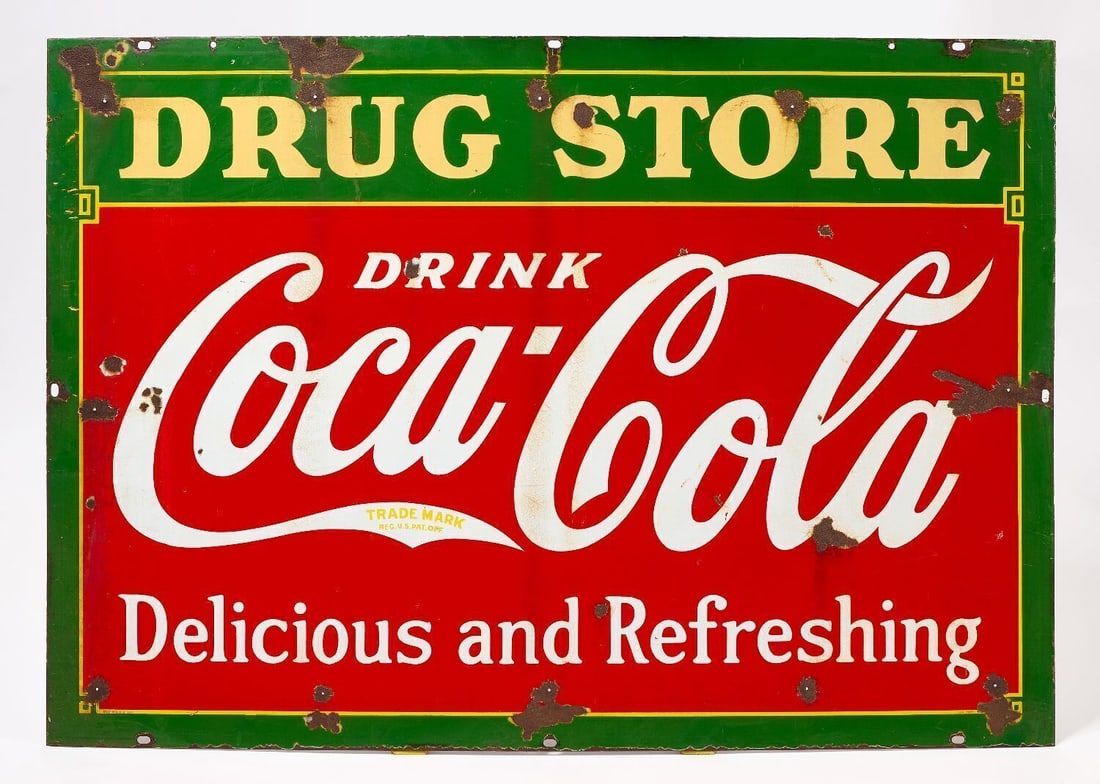 Coca Cola Drug Store Porcelain Sign: Coca Cola 'Drug Store' sign with slogan 'Delicious and Refreshing'. Double sided porcelain. Signed Tennessee Enamel Co. American, circa 1935. H 42 in. W 60 in. Provenance: Collection