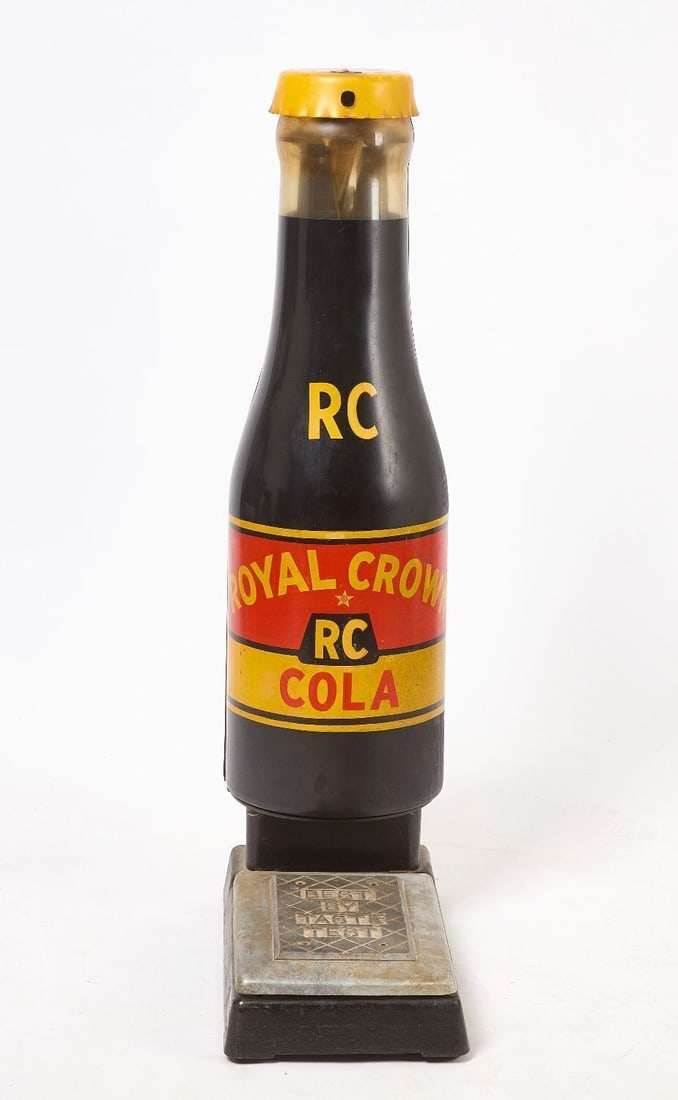 RC Cola Coin-Op Scale: RC (Royal Crown) Cola coin-op scale. Figural two-part bottle with screw-on bottlecap. Metal scale plate bearing phrase 'Best By Taste Test'. Label from Advertising Scales Co. (New York).