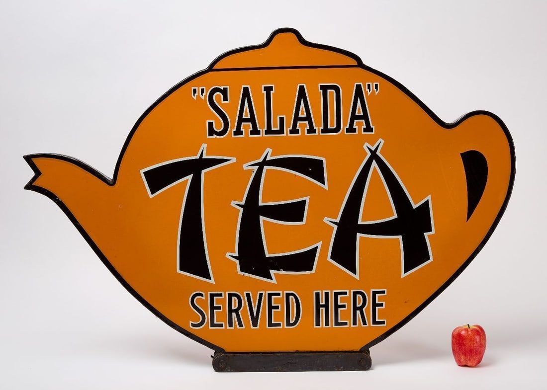 Salada Tea Figural Teapot Curb Sign: 'Salada Tea Served Here'. Double-sided porcelain in the form of a teapot. Original curb stand hardware. Canadian, circa 1930. H 29-1/4 in. W 42 in. D 1-1/2 in. Provenance: Collection of Paul