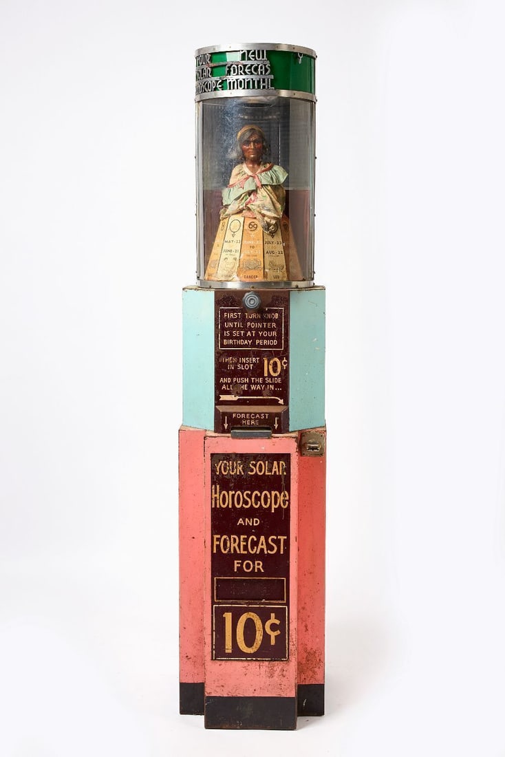 Solar Horoscope 10-Cent Fortune Teller: Fortune teller machine. 'Your Solar Horoscope and Forecast for 10 Cents'. Interior 'grandma' puppet with revolving astrological signs. Metal body with original paint. Peerless Vending