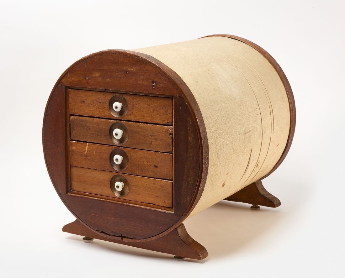 J & P Coats Figural Spool Advertising Cabinet: J & P Coats figural spool advertising cabinet with four drawers. American, circa 1930. H 19-3/8 in. W 22-1/4 in. D 18 in.