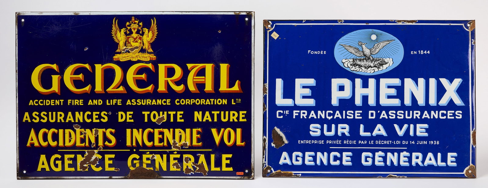 Two French Insurance Signs: Two insurance signs. Single-sided enamel. One with phoenix graphic (Phenix company). France, circa 1930. H 19 in. W 26-3/4 in. and H 17-1/2 in. W 23-3/4 in. 