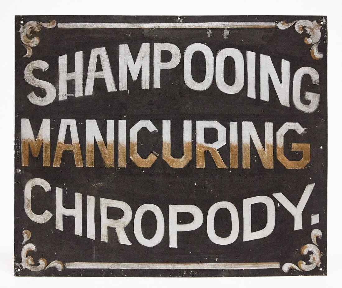 Trade Sign - Shampooing, Manicuring, Chiropody: Early trade sign for shampooing, manicuring, and chiropody. Single-sided original paint on tin with stylized border. American, circa 1900. H 20 in. W 24 in. The term 'Chiropody' is