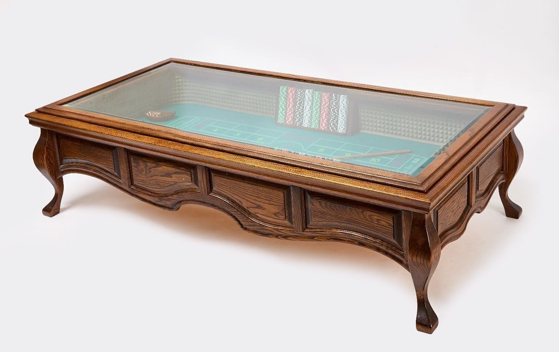 Caesars Palace Craps Table: Caesars Palace craps table. Low table with glass top. Chips and rake included. H 18-3/4 in. W 71 in. D 35-1/2 in. Provenance: Collection of Paul and Dodi Algiers (Massachusetts, USA).