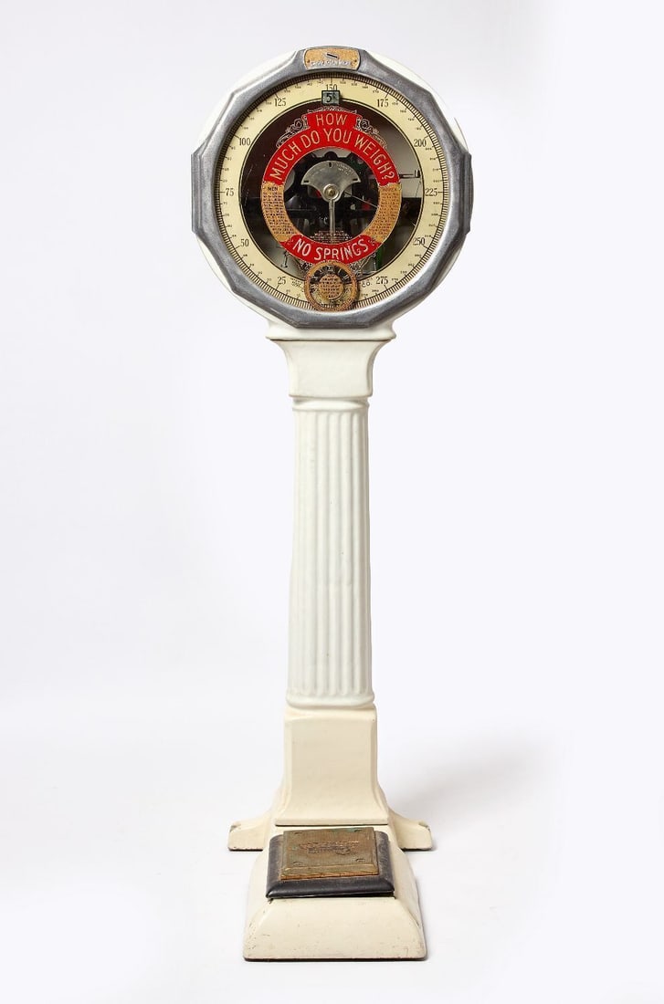 Watling 5-Cent Lollipop Scale: Watling 5-Cent Lollipop Scale. Lollipop-form porcelain cast-iron scale with painted glass window, with working weight-telling knob. Base plate with Watling name. Chicago, circa 1920-30. H 72 in. W 24
