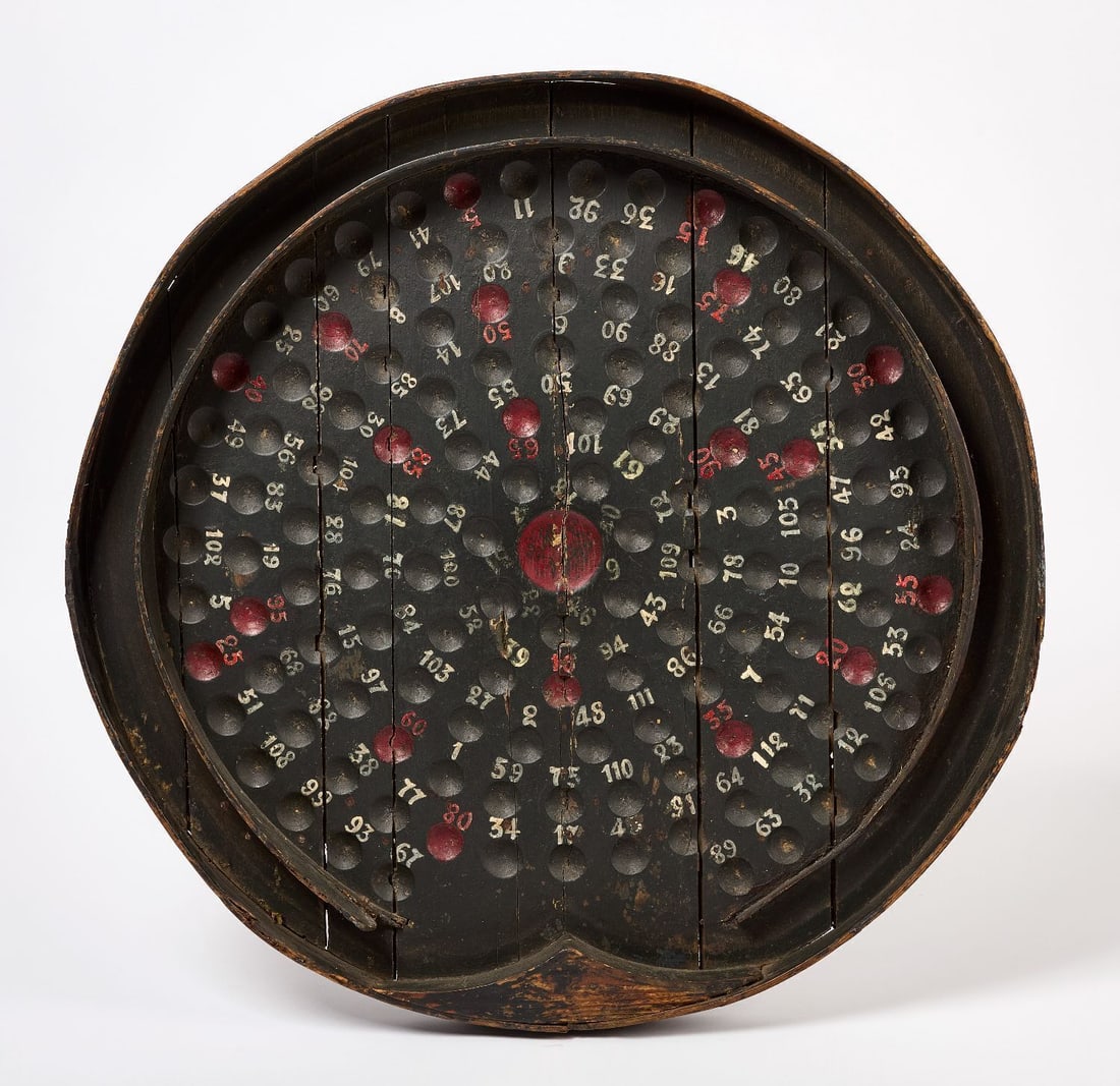 Large Numbered Carnival Gambling Game Board: Large circular carnival gambling game board with numbered divets. Original paint on wood panel. American, circa 1910. D 39 in.