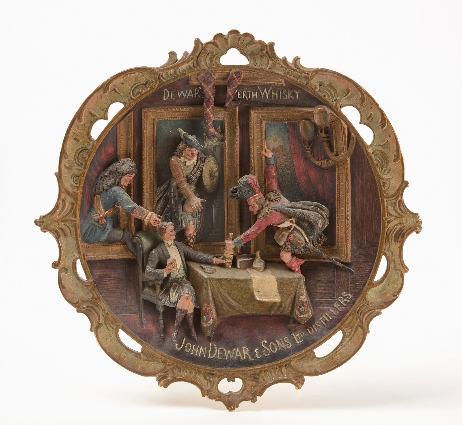 Dewar's Perth Whiskey Figural Platter: Dewar's 'Perth Whiskey' figural 3-dimensional platter. Backside stamped 'Made in Bohemia'. Mid 20th century.H 15-3/4 in. W 16 in.Provenance: Collection of Paul and Dodi Algiers (Massachusetts, USA).
