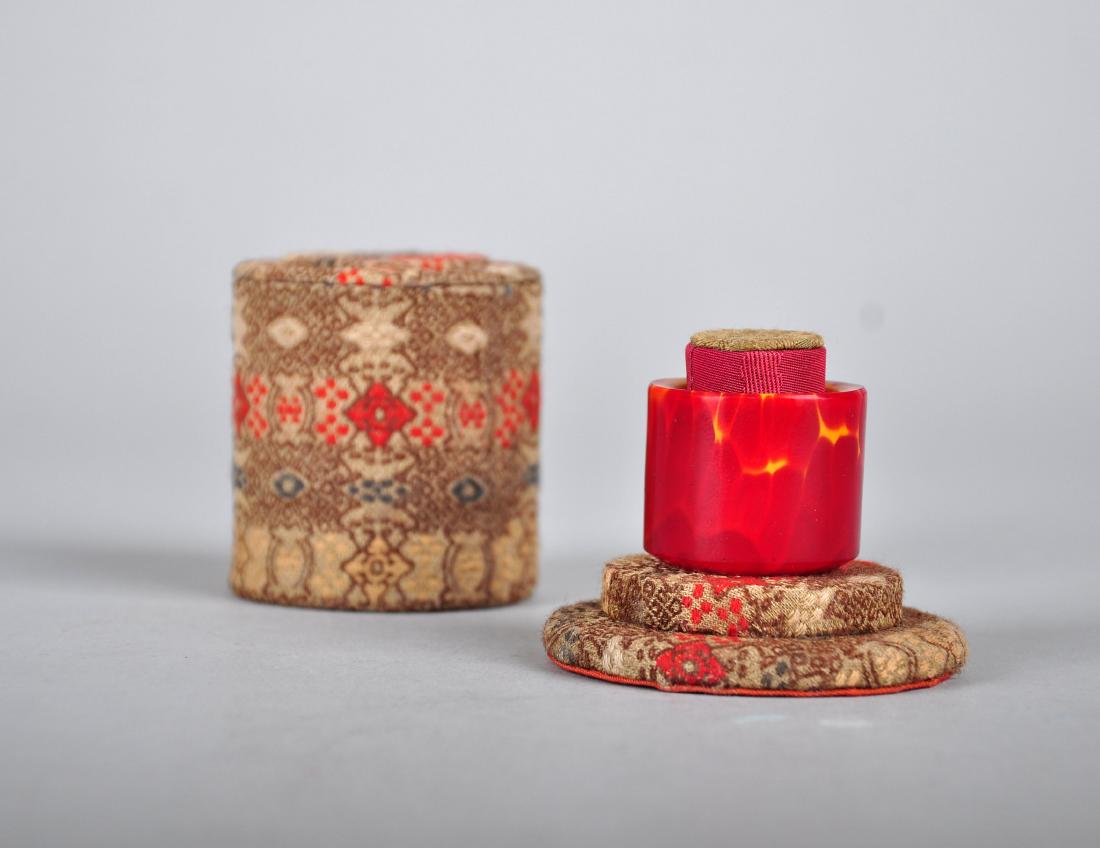 A REALGAR THUMB RING, 18TH CENTURY (1 of 6)