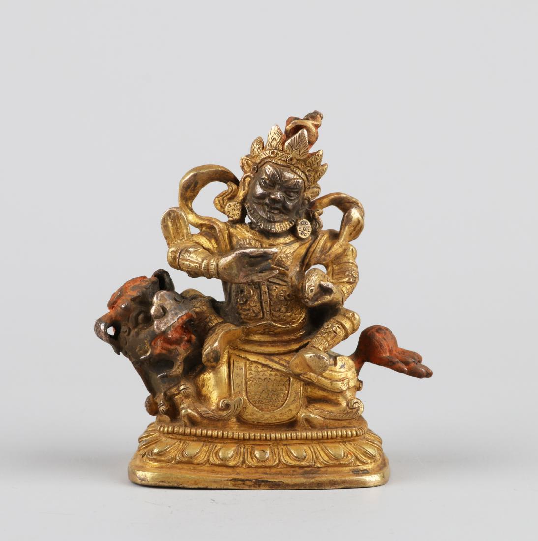 A SMALL GILT BRONZE FIGURE OF GUARDIAN, QING DYNASTY (1 of 7)