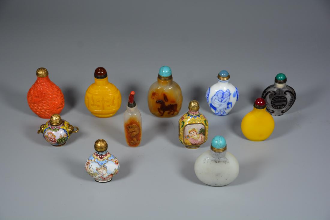 A GROUP OF ELEVEN SNUFF BOTTLES, QING OR LATER (1 of 6)
