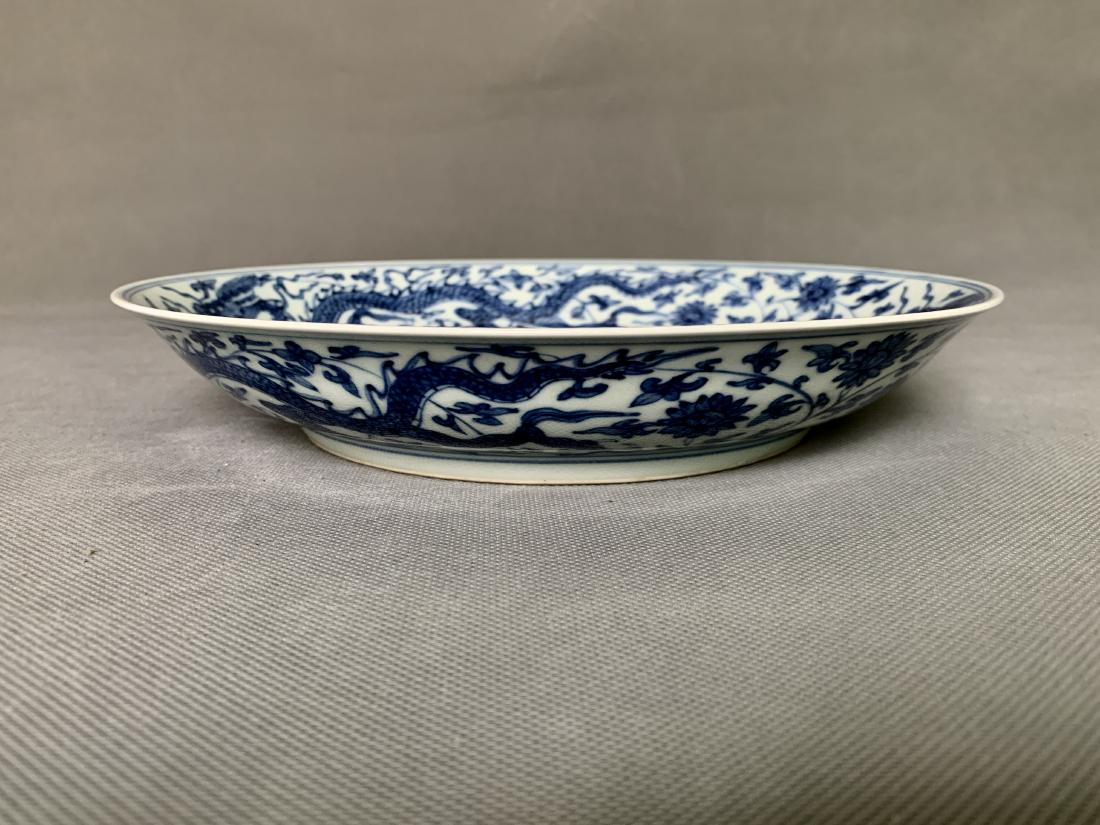 A CHINESE BLUE AND WHITE 'DRAGON' DISH, HONGZHI MARK, (1 of 7)