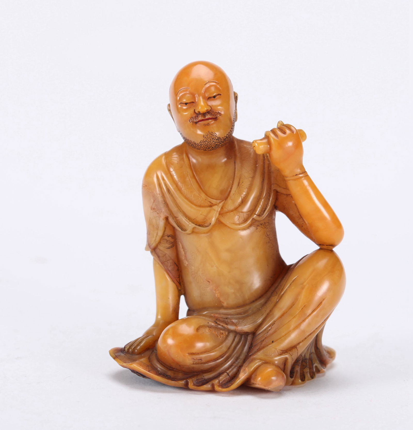 A CHINESE SOAPSTONE FIGURE OF A LUOHAN, QING DYNASTY (1 of 5)