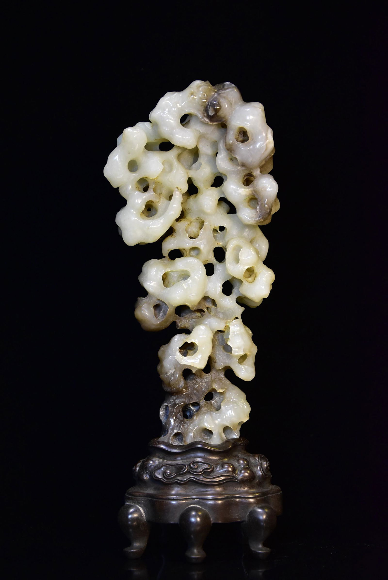A CHINESE CARVED JADE SCHOLAR' ROCK, QING DYNASTY (1 of 7)