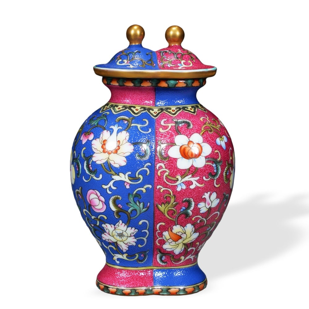 QIANLONG FAMILLE ROSE CONJOINED 'TWIN' LIDDED VASE WITH SGRAFFITO FLORAL DECORATION ON PINK AND BLUE: Qianlong Famille Rose Conjoined 'Twin' Lidded Vase with Sgraffito Floral Decoration on Pink and Blue Grounds Dimensions: H: 6 1/2 in (16.5 cm); W: 4 in (10 cm) This unusual conjoined vessel takes the
