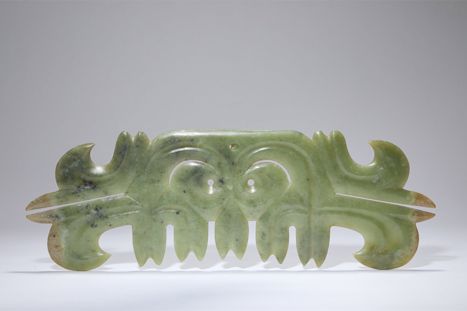 A JADE CLOUD-SHAPED PENDANT: WIDTH 43.5 CM × HEIGHT 15 CM
