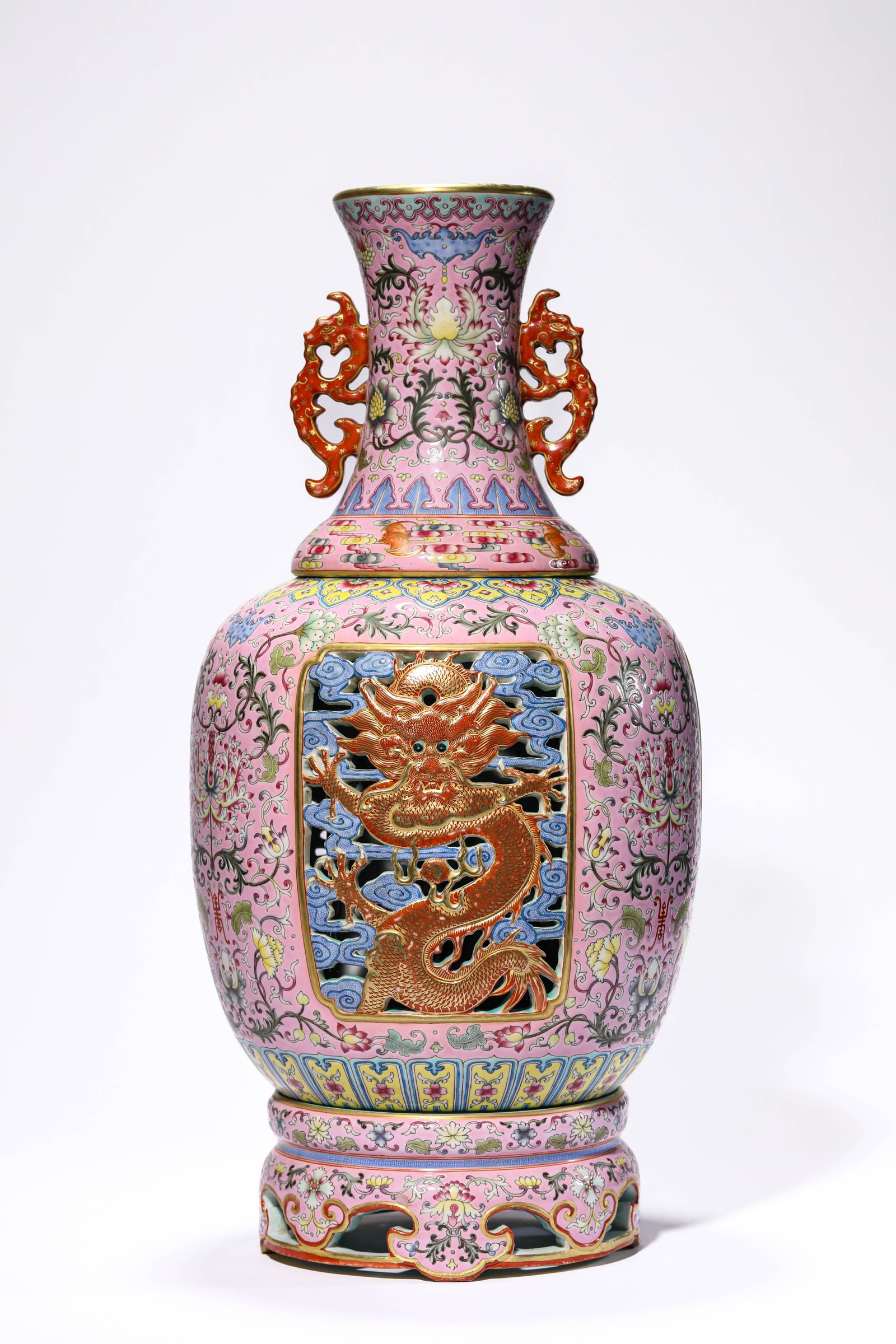 A FAMILLE-ROSE REVOLVING VASE WITH DRAGON DECORATION: WIDTH 20.6 CM × HEIGHT 43.3 CM
