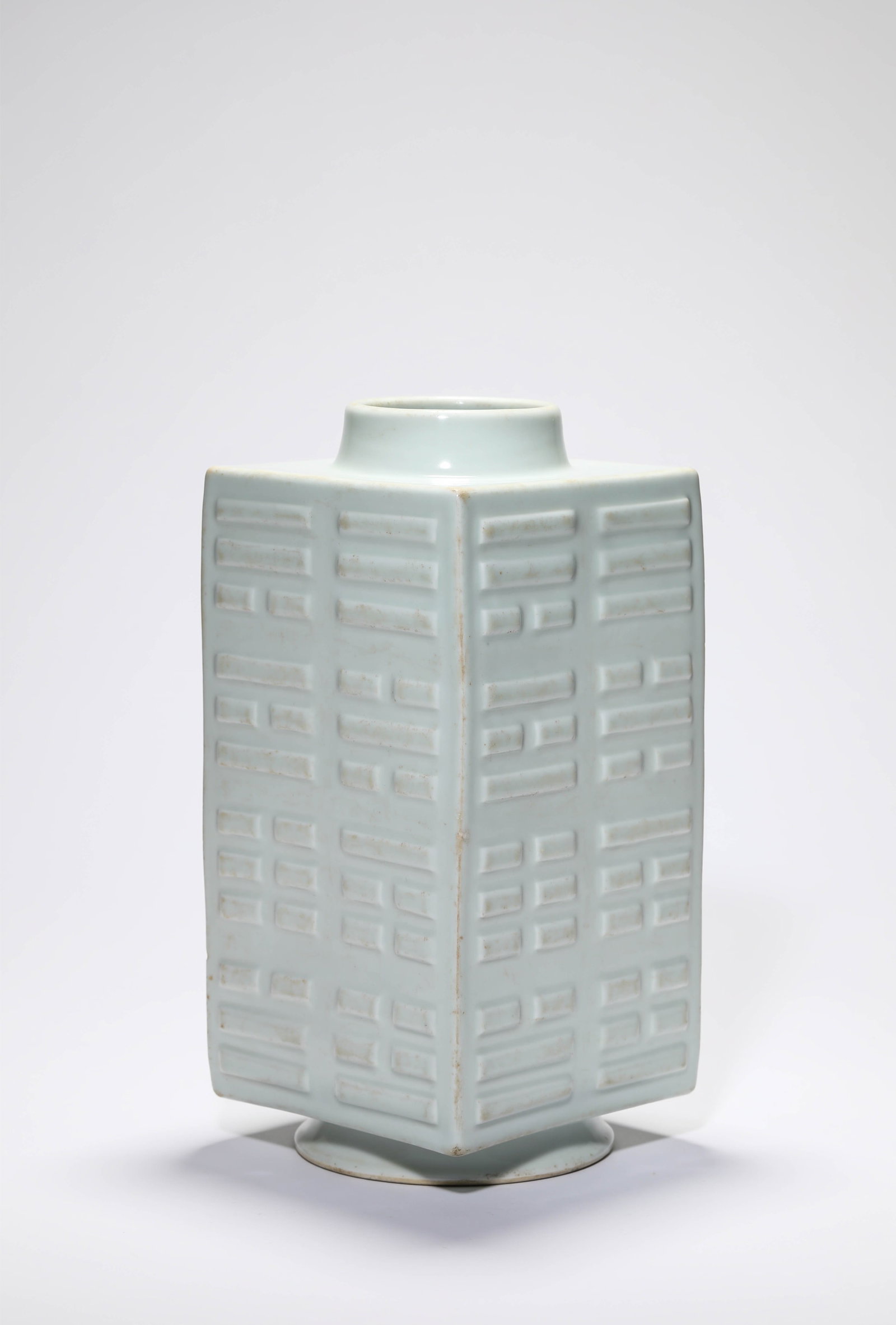 A WHITE-GLAZED CONG-FORM VASE: WIDTH 14 CM × HEIGHT 28 CM