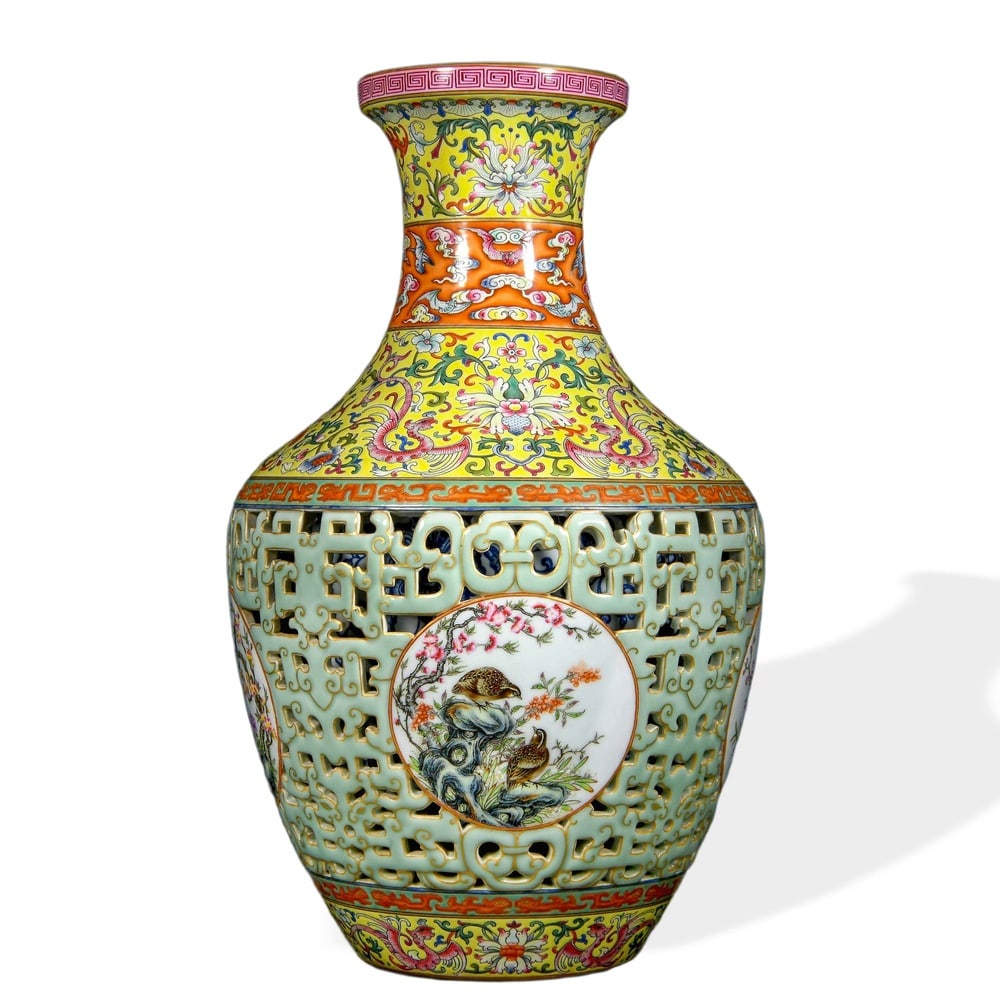 QIANLONG RETICULATED 'MAGPIE ON PLUM' SLEEVE VASE WITH FAMILLE ROSE DECORATION ON CELADON GROUND (1 of 3)