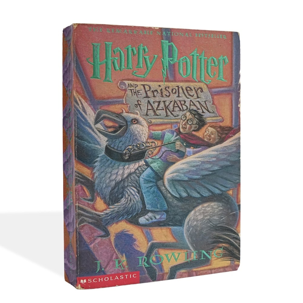 J. K. ROWLING SIGNED HARRY POTTER AND THE PRISONER OF AZKABAN FIRST PRINTING: 8 1/8 x 5 3/8 in (20.5 x 13.6 cm) Harry Potter and the Prisoner of Azkaban represents a pivotal turning point in J. K. Rowling's acclaimed Harry Potter series, introducing Sirius Black, Professor Lupi