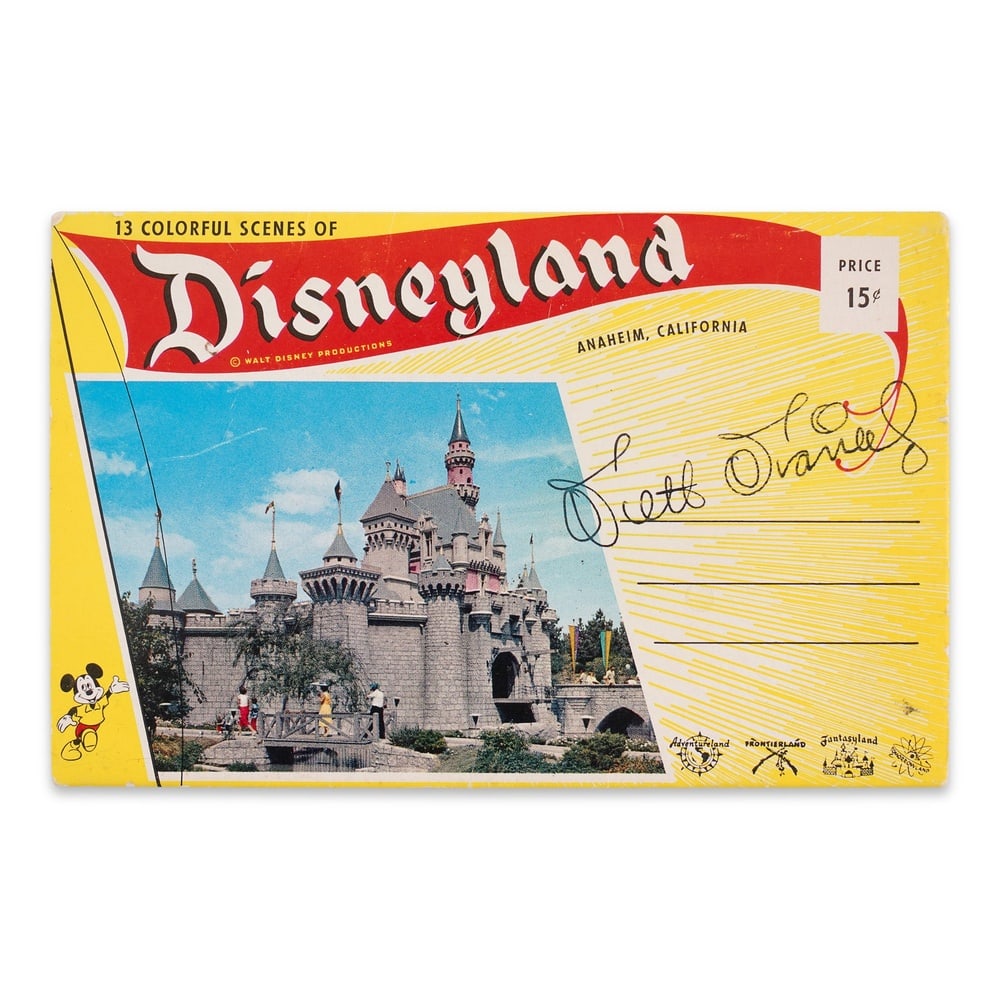 WALT DISNEY SIGNED DISNEYLAND SOUVENIR POSTCARD FOLDER BOOKLET: 6 1/8 x 3 7/8 in (15.5 x 10 cm) Provenance and Authentication: This collectible has undergone a rigorous forensic evaluation. The signatures were carefully analyzed across multiple criteria, including