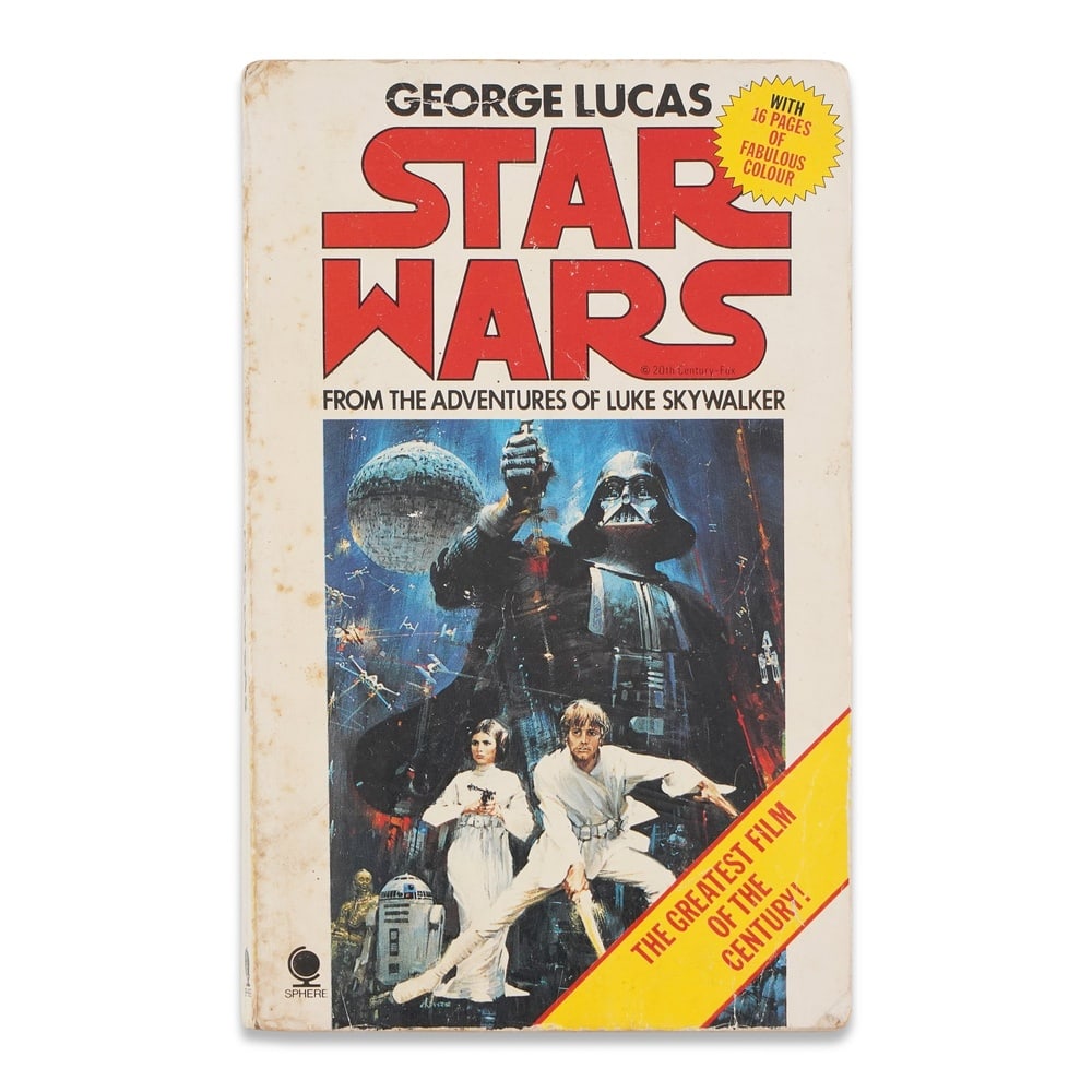 GEORGE LUCAS & MARK HAMILL SIGNED "STAR WARS: FROM THE ADVENTURES OF LUKE SKYWALKER": 7 x 4 3/8 in (17.8 x 11 cm) Provenance and Authentication: This collectible has undergone a rigorous forensic evaluation. The signatures were carefully analyzed across multiple criteria, including