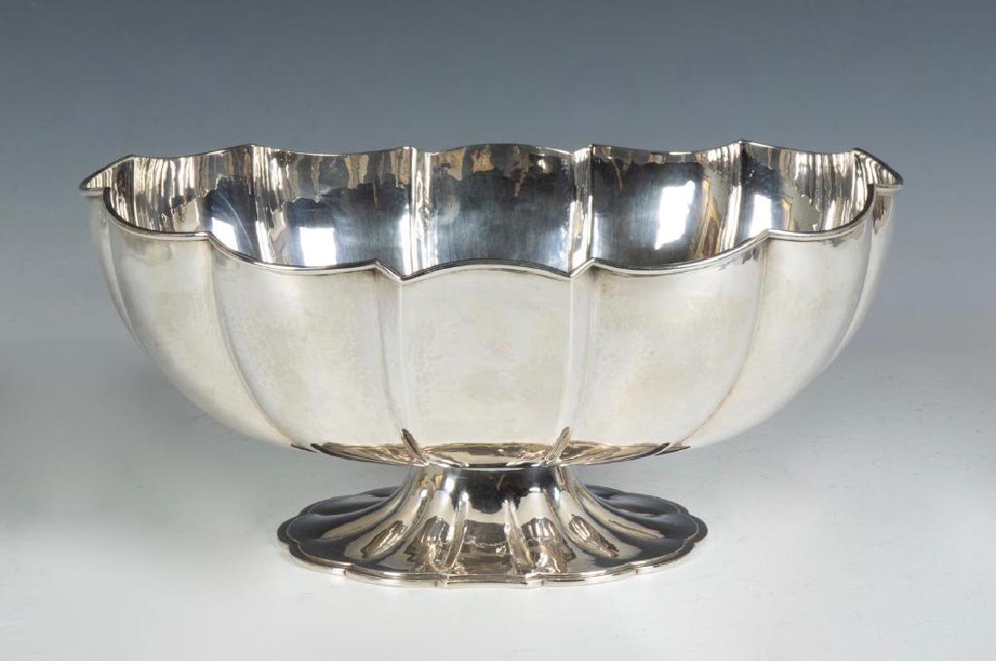 Buccellati Sterling Silver Centerbowl: Lobed form with hand hammered surface raised on splayed scalloped foot. 21.123 troy oz 10.25 in.w. x 4.5 in.h. 
