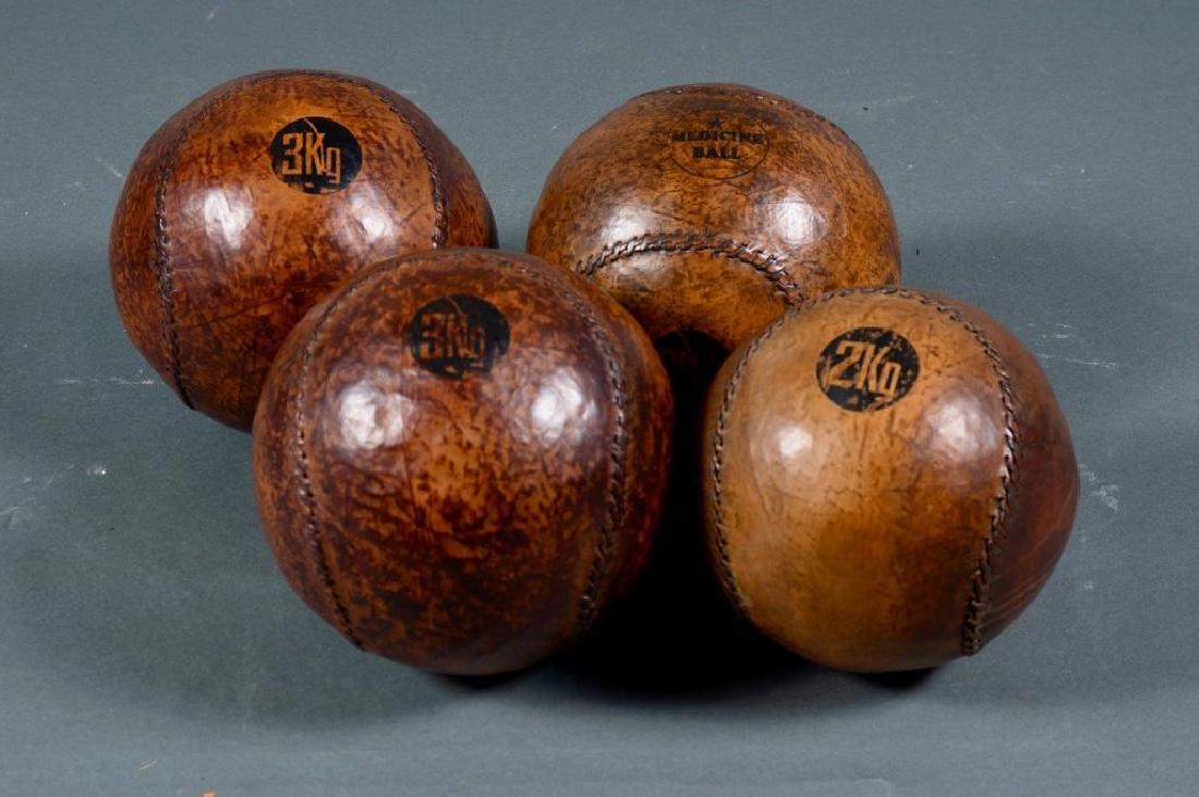 Four Antique Leather Covered Medicine Balls (1 of 4)