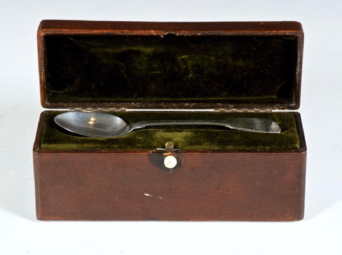 Traveling Tea Caddy, London 1834: Fully hallmarked sterling silver tea spoon with tea caddy, the interior for tea, the cover fitted to hold the spoon, with hinged lid and bone closure in buckram covered box, 2.5 x 6.5 2 in. Purchased 