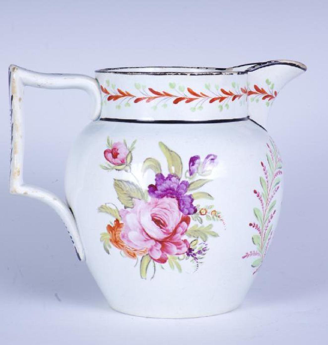 Creamware Milk Jug: Dated 1825, fine crazing throughout white glazed body with hand painted decoration of floral bouquets and cartouche of berry sprigs having "MM 1825". Unmarked, very good condition, 5-3/4"T. Some