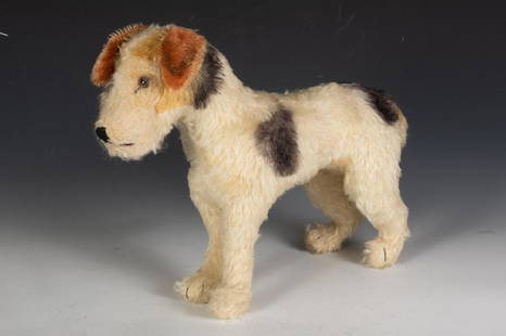 Steiff Wire Hair Fox Terrier: Mohair. 13 in. h. x 11 in. l. Condition: slightly worn