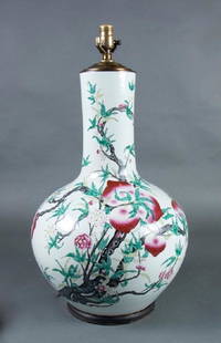 Large Attractive Chinese Famille Rose Nine Peach Vase: Late Qing Dynasty, the globular body with cylindrical neck enameled with nine peaches on leafy flowering branches. 24 in.h.Â  Condition: Was fitted as a lamp, base drilled, bottleneck rim with very