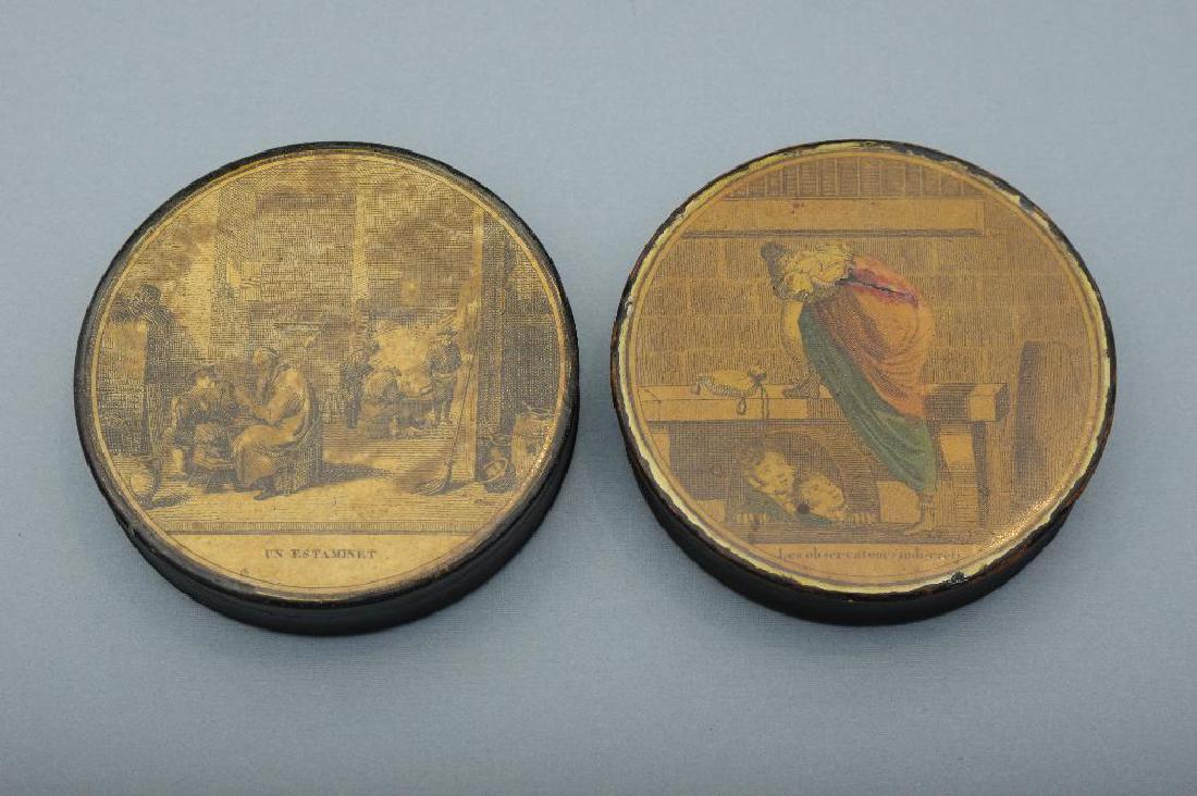 Two Antique Snuff Boxes with Applied Prints: A tavern scene titled 'Un Estaminet, ' and an erotic scene entitled 'Les observateurs indiscrets.' 3.5 in.D. Condition: Wear, losses, shrinkage