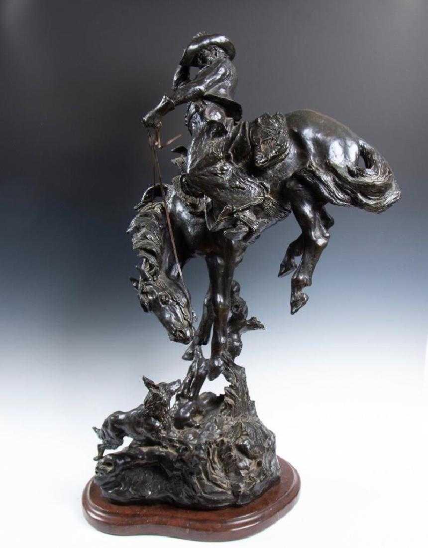 Elie Hazak Bronze, Durn Critter: Elie Hazak (American, b. 1945). "Durn Critter", cast bronze sculpture of a horse and rider with a wolf. Attached to a red marble base. Inscribed by the artist and dated 1978, edition numbered 10/20. A
