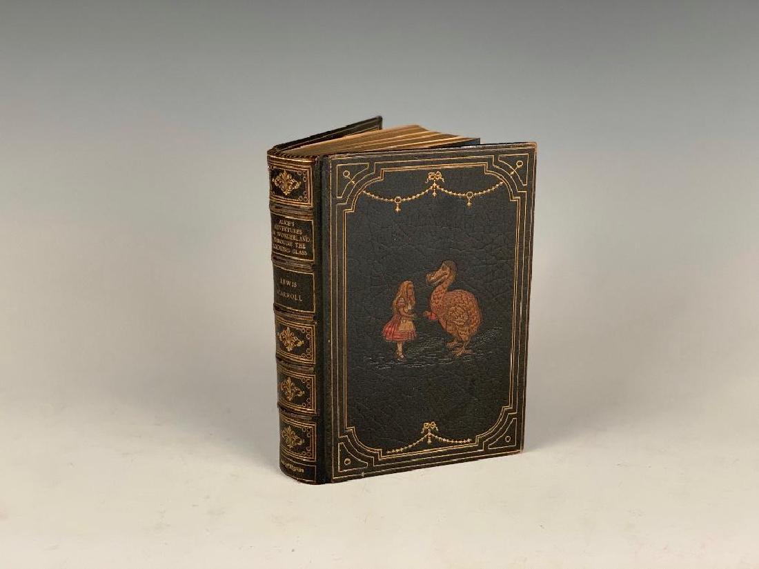 Alice's Adventures in Wonderland and Through the: With (92) Illustrations by John Tenniel. London: MacMillan & Co., Limited. 1932 & 1928, respectively. A specially bound, unique double decker bound in decorative green morocco by Riviere 