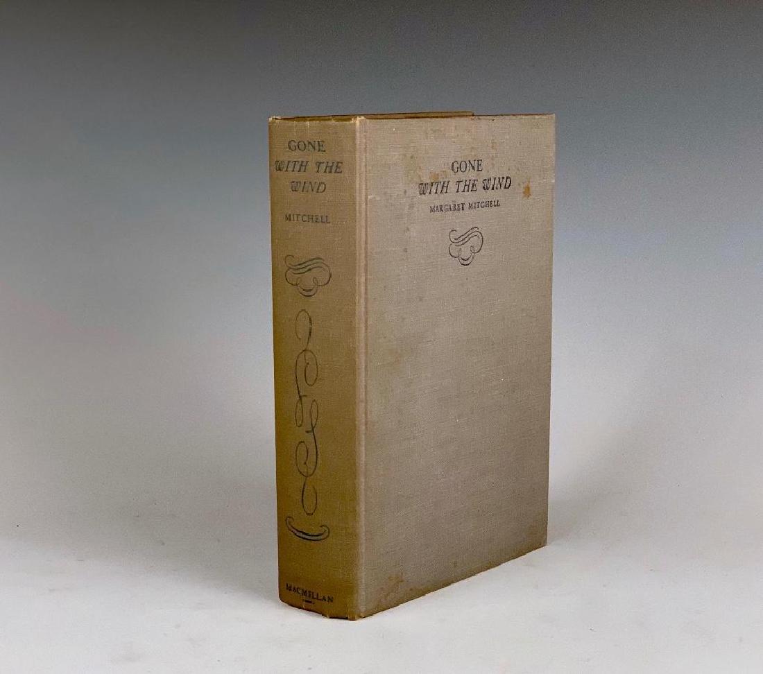 First Edition "Gone With The Wind", by Margaret: New York: MacMillan Company, 1936. 8vo. Original gray cloth boards, hardbound, copyright page states "Published May, 1936." Only 10,000 copies were produced of this true first printing in May, 1936.&n