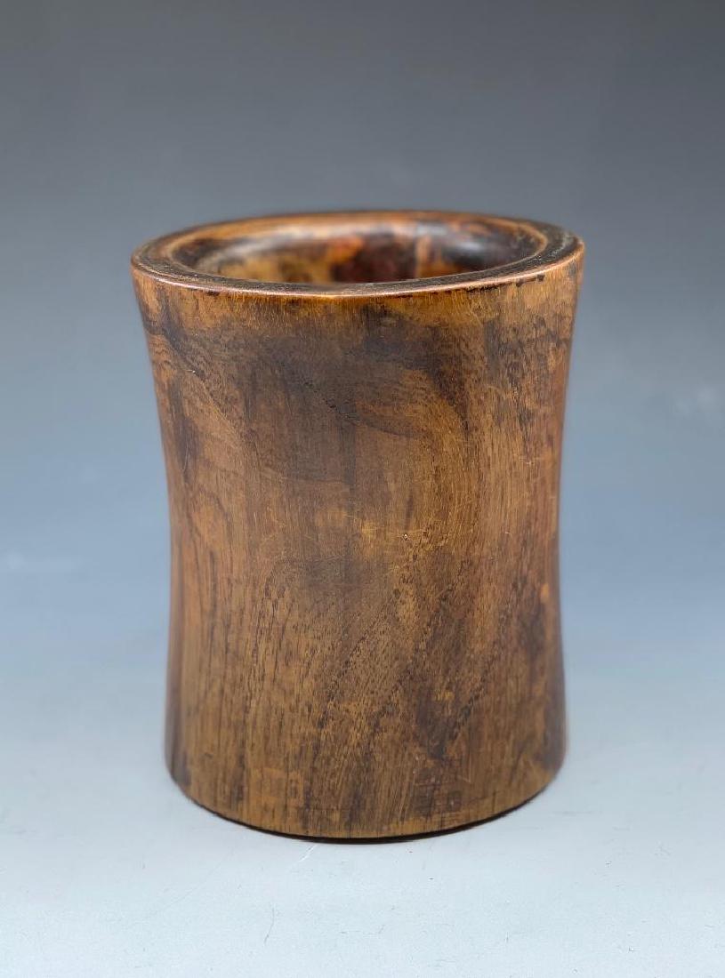 Carved Wood Brushpot, Chinese, 19th Century: Simple cylinder form with soft flare, carved of elm wood. Small knot hole fill on side. 6-1/4"T x 5"D. Lots of interior wear, conducive to age and use. 