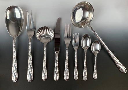 Buccellati Torchon Sterling Silver Flatware Service for: "Torchon", one of the most popular patterns made by Buccellati. Five piece place setting for twelve persons include a 8-1/2" dinner fork, 7" dessert fork, 7" soup spoon, 5-4/3" coffee spoon, 9-4/3"din