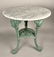 A Victorian Style Cast Iron Garden Table