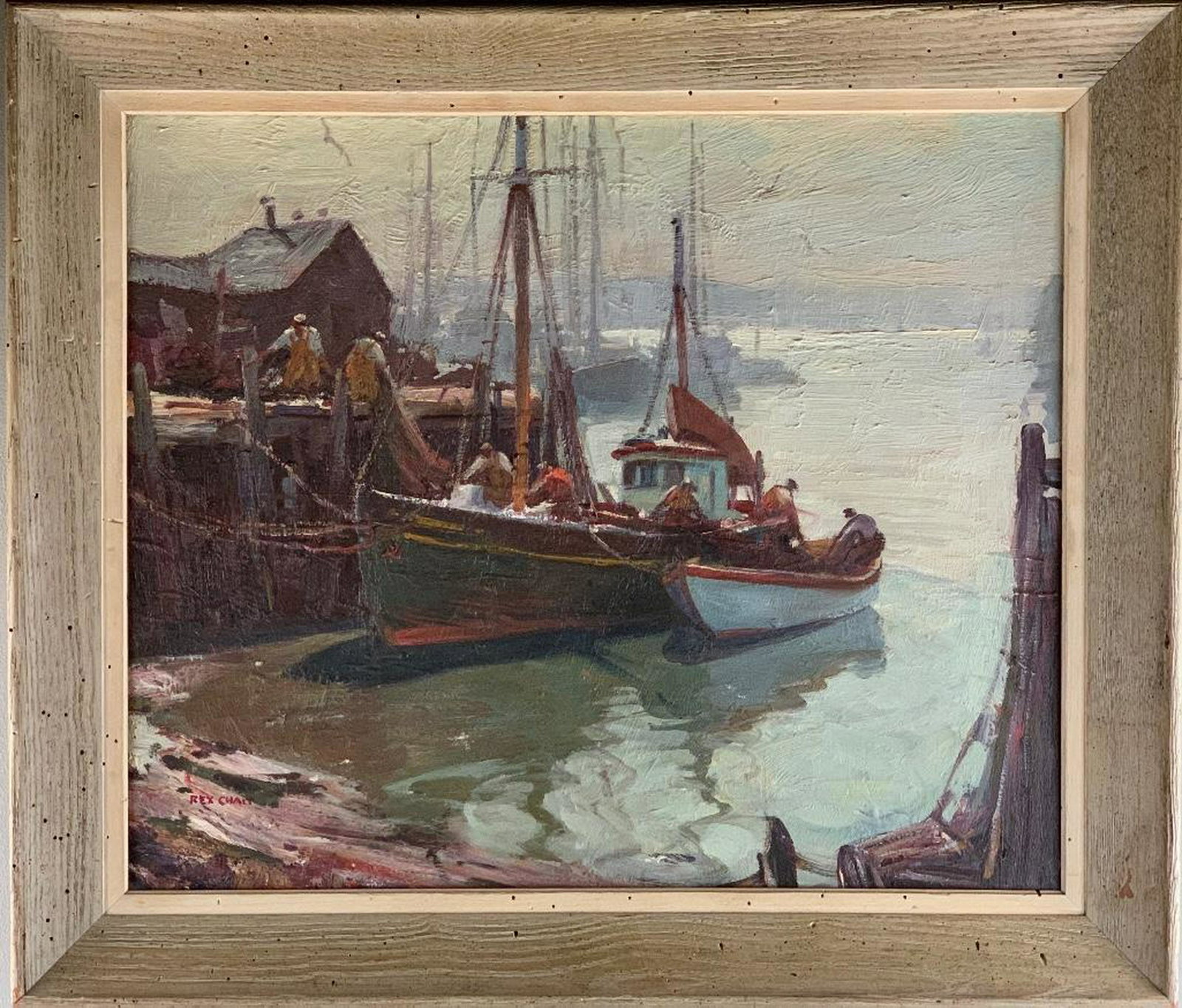 Rex Chait (American 20thc.) New England Fishing Boats: Rex Chait (American 20thc.) New England Fishing Boats in Harbor, oil on canvas, signed lower left. Framed 20 x 24 in. canvas size 25 x 29 in. as framed Condition: Very good with no damage or repair.