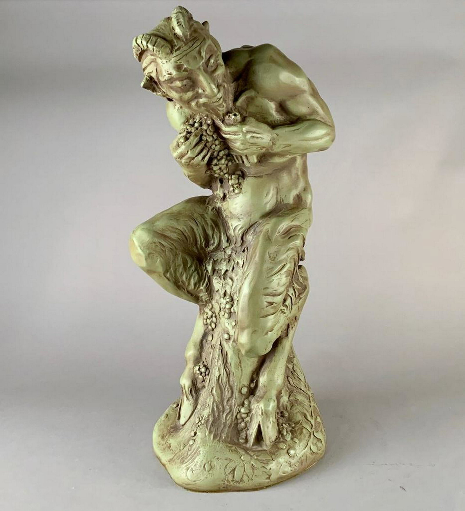 Richard Sedlon (American, Cleveland School 1900-1992): Richard Sedlon (American, Cleveland School 1900-1992) Satyr, 1972, plaster with green patination, signed and dated. 22 in.h. Condition: Crack and repair to one horn.