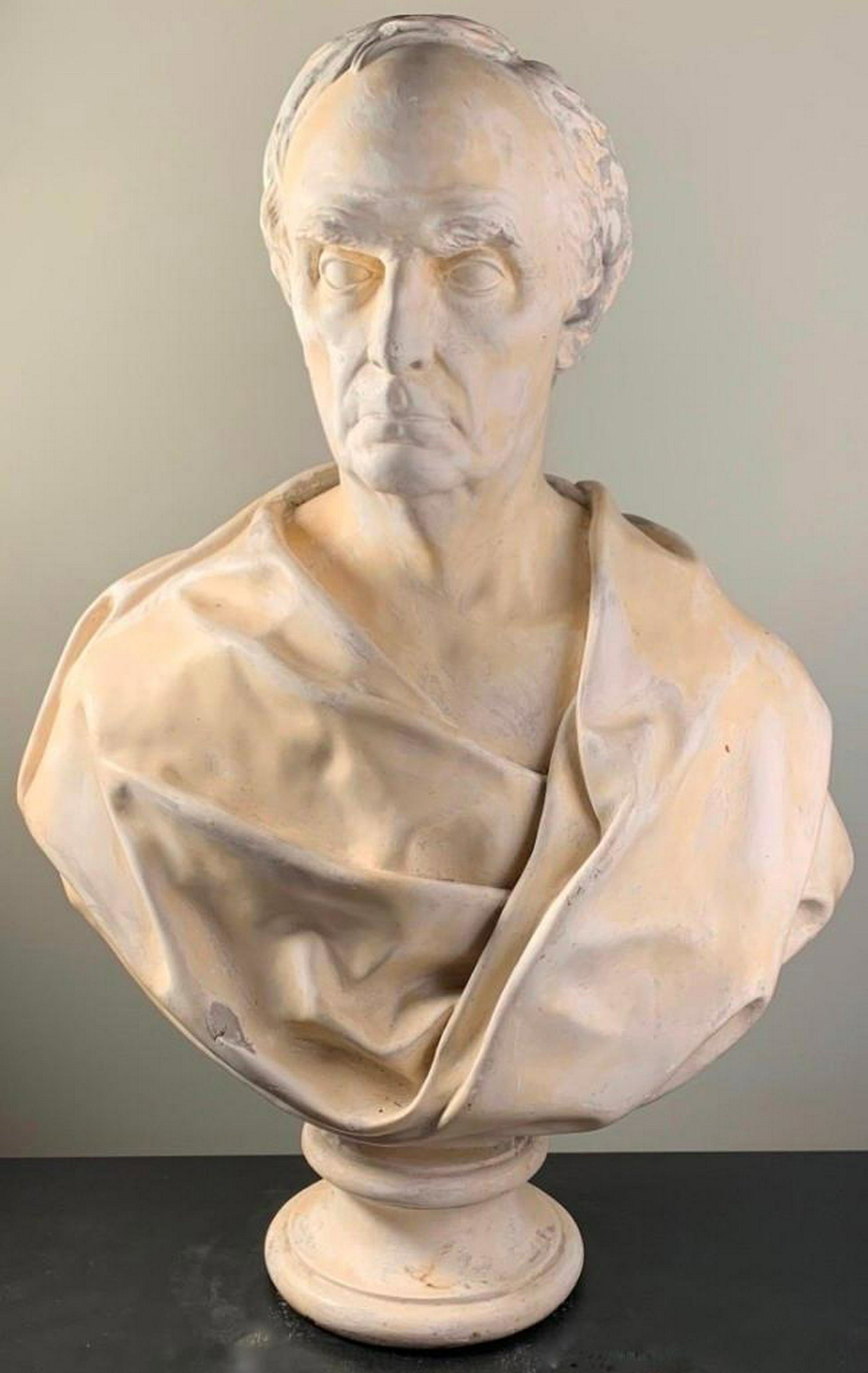 P.P. Caproni and Brothers Monumental Plaster Bust: P.P. Caproni and Brothers Monumental Plaster Bust, of a Roman Scholar or Poet, wrapped in a toga, raised on plaster socle. With brass tag signed P.P. Caproni & Brothers Plastic Arts, Boston. 34 x 23 x