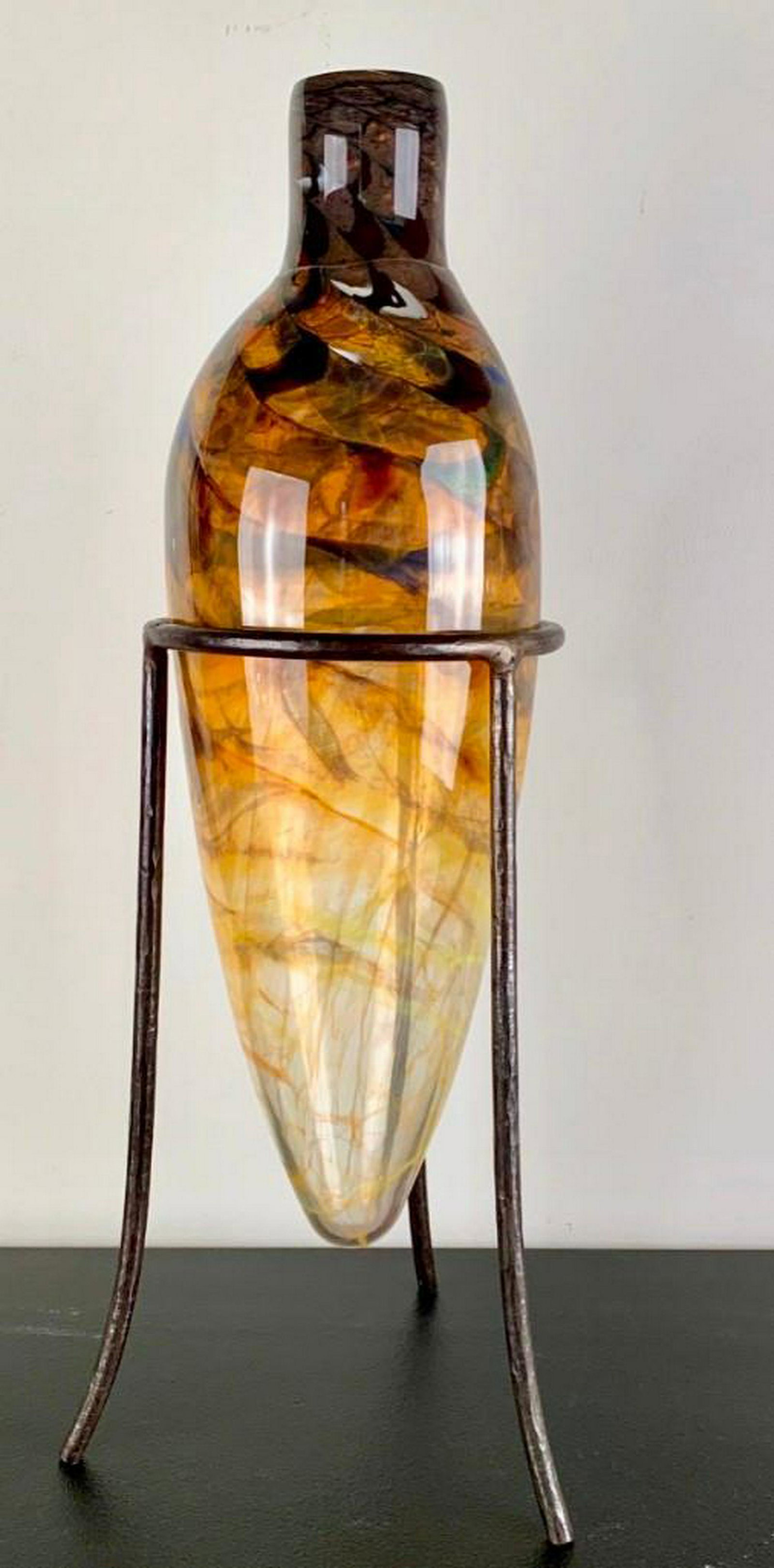 Kathleen Mulcahy (American, 20th/21st C.): Kathleen Mulcahy (American, 20th/21st C.) Oval,Yellow, Copper and Ruby Flask, hand blown glass vessel in fitted steel stand. 24 x 7 in. Condition: Very Good