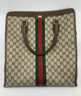 Vintage Gucci Supreme Monogram Tote Bag: Authentic Gucci tote bag made in the early 1980s, good pre-owned condition. Made from Gucci's signature supreme web canvas, with brown pigskin handles and trim, and iconic green and red twill cotton r