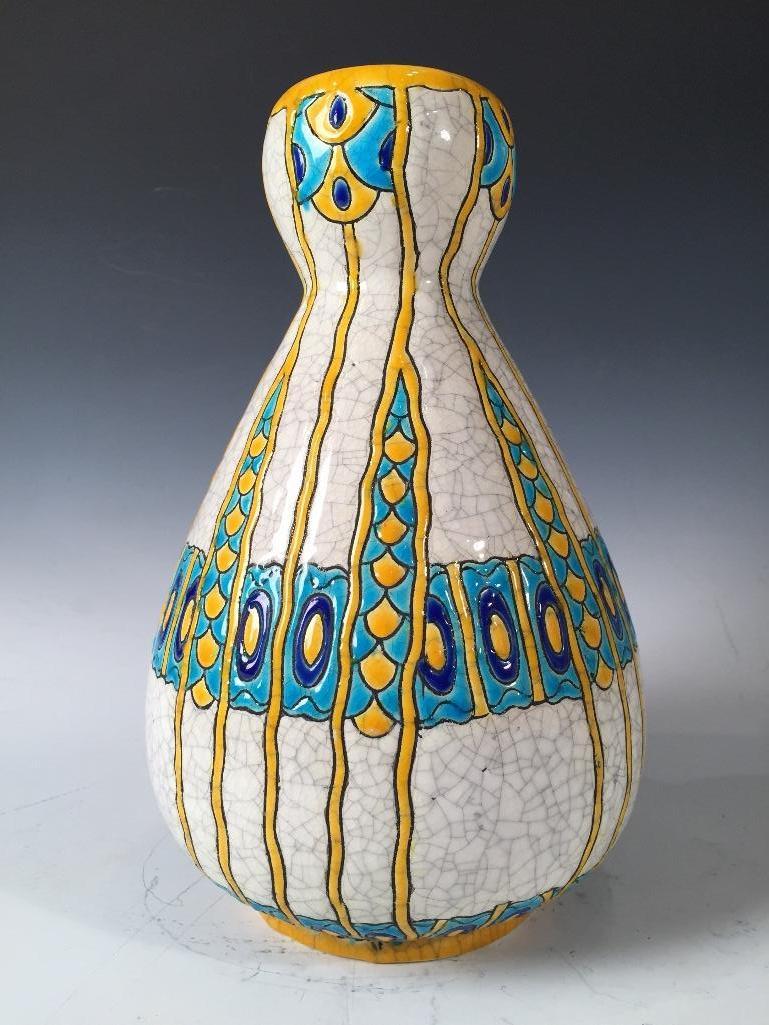 Boch Freres Glazed Ceramic Vase, Art Deco: Boch Freres La Louviere Glazed Ceramic Vase, in Art Deco style, the ovoid form with rounded neck glazed with a stylized pattern in turquoise, yellow and cobalt blue over a crackle ground, stamped Boc