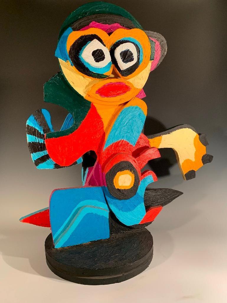 David Gerstein (Israeli b.1944): David Gerstein (Israeli b.1944) Colorful Figure, c.1980's, painted wood on rotating base. 30 in.h. x 31 in. w. x 12 in.d. Condition: 1 inch paint loss to top, with scattered minor bumps and pain
