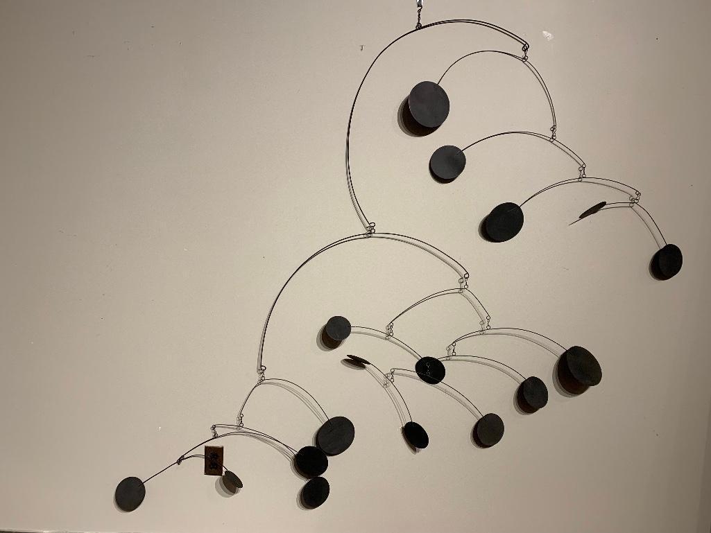 Large Pendant Mobile, 20thc.: Large Pendant Mobile, 20thc, in the style of Alexander Calder, black painted metal. Approximately 64 x 78 in. Condition: Light wear as appropriate to age and use