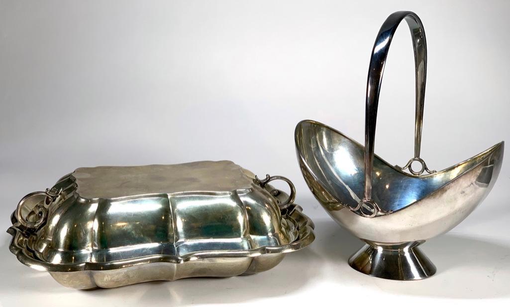 Two Pieces of Sterling Silver Hollowware: Two Pieces of Sterling Silver Hollowware, comprising a Reed and Barton Windsor pattern covered vegetable dish and a 1950's style German handled basket. 1415 g. 45.49 oz.troy total weight 11 in. length