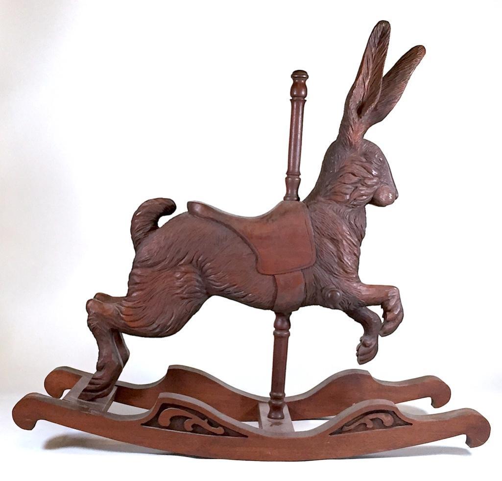 Joe Leonard Hand Carved Carousel Rabbit Rocker: Joe Leonard (American 20thc, Pittsburgh)Hand Carved Carousel Rabbit Rocker, mid.20thc, finely hand carved in walnut, depicting a rabbit wearing a saddle, with foot pegs and pole handle, on carved waln