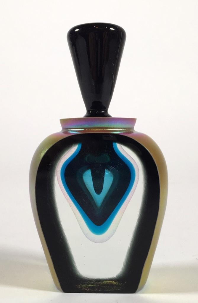 Art Glass Perfume by Steve Correia: Art Glass Perfume by Steve Correia, of baluster form in iridescent gold glass with flat sides, internally decorated heart shaped interior in cased blue and clear glass with internal glitter, with cone